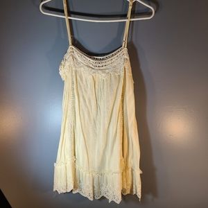 Leah Alexander ivory blouse with lace accents